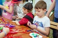 Children participating at art and craft outdoor workshop
